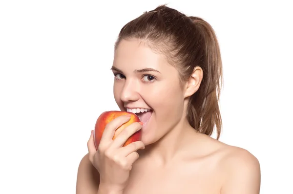 Beautiful brunette with the red apple — Stock Photo, Image