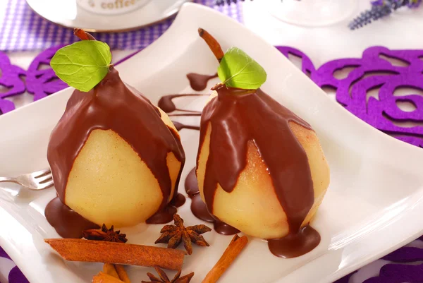 Poached pears with chocolate — Stock Photo, Image