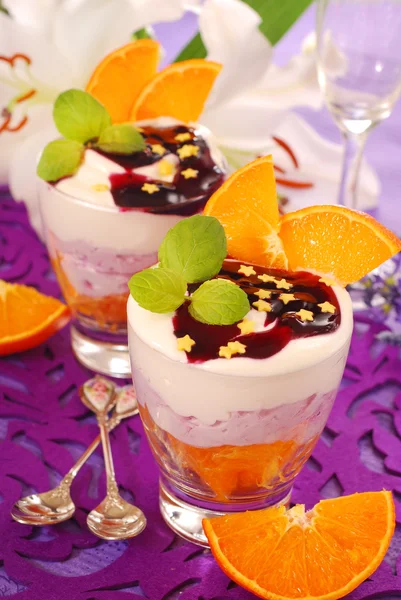 Dessert with oranges and blueberries — Stock Photo, Image