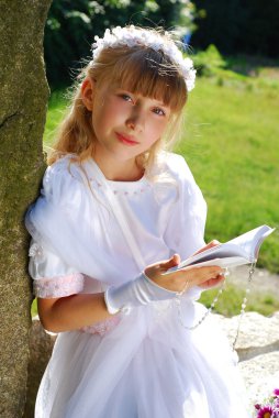 Girl going to the first holy communion clipart