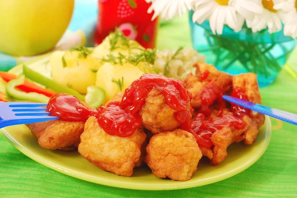 Dinner with fish nuggets — Stock Photo, Image