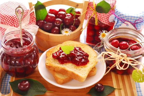 Breakfast with cherry preserves — Stock Photo, Image
