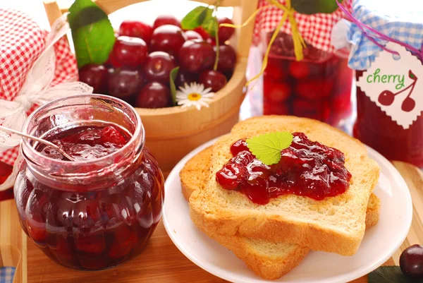 Breakfast with cherry preserves — Stock Photo, Image