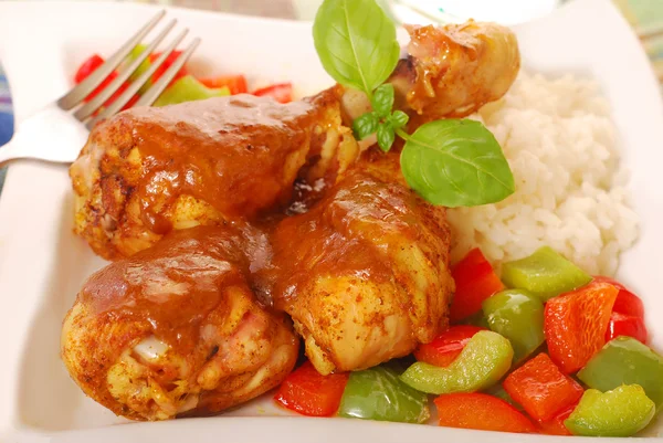 Baked chicken legs with curry — Stock Photo, Image