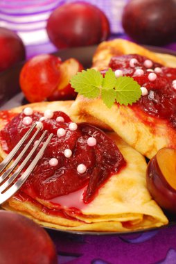 Pancakes with plum confiture clipart