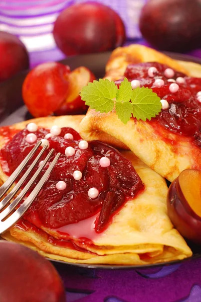 Pancakes with plum confiture — Stock Photo, Image