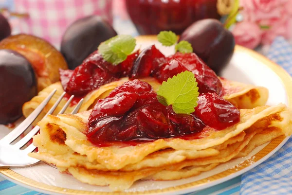 Pancakes with fresh plum`s confiture — Stock Photo, Image