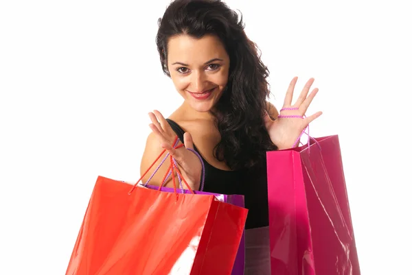 Mujer joven con bolsas de compras primer plano aislado sobre fondo blanco — Foto de Stock