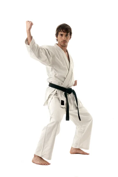 Karate macho luchador joven aislado sobre fondo blanco — Foto de Stock