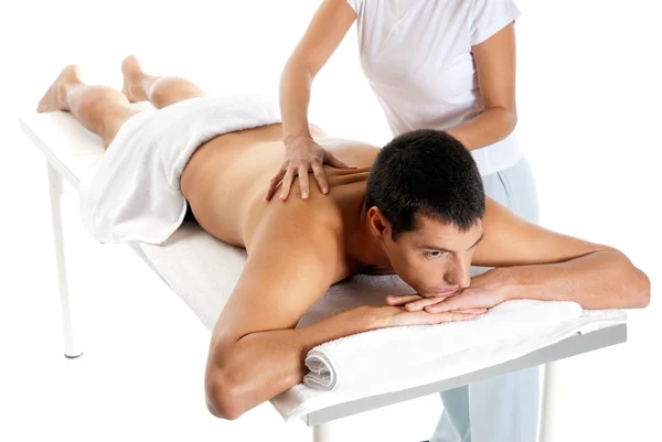Człowiek otrzymujący masaż relaks leczenia z rąk kobiet Obrazy Stockowe bez tantiem