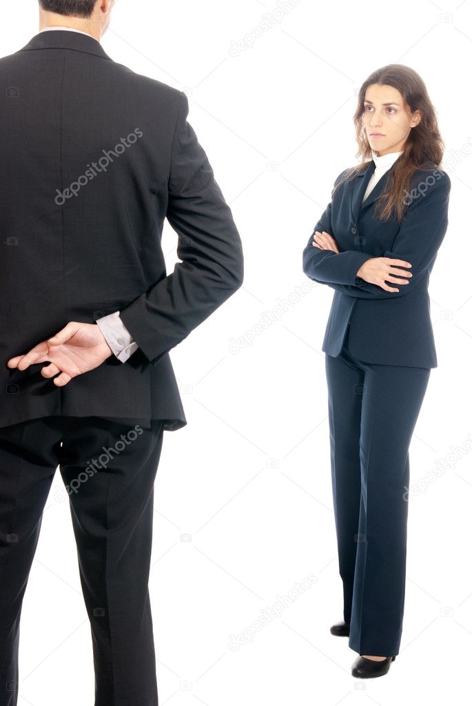 Business concept fingers crossed in front of boss isolated on white backgro