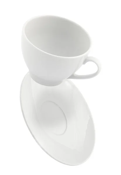 Falling coffee cup and saucer — Stock Photo, Image