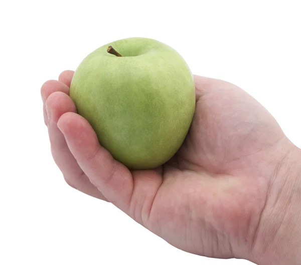Grüner Apfel in der Hand — Stockfoto