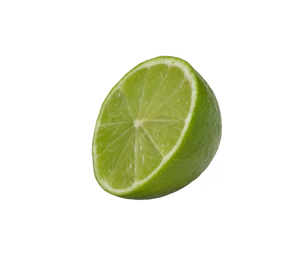 Yeşil limon, yarıya izole — Stok fotoğraf