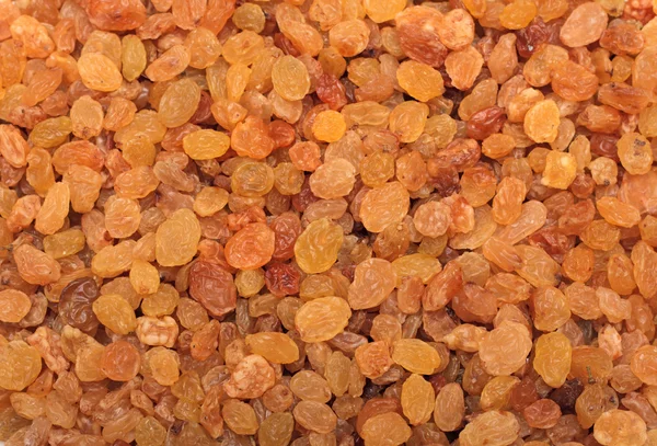 Brown raisins. Background — Stock Photo, Image