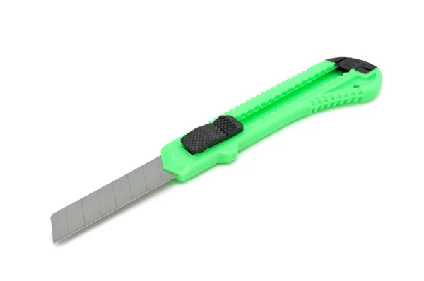 Πράσινο πλαστικό βοηθητικό πρόγραμμα μαχαίρι, απομονωμένη — Φωτογραφία Αρχείου