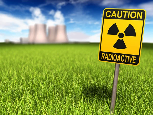 Радиоактивный знак и АЭС — стоковое фото