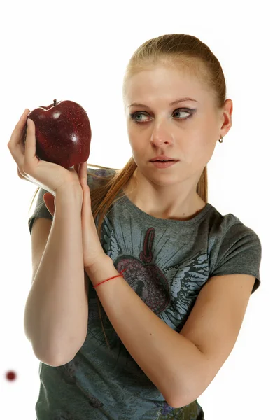 The blonde with an apple on a white background — Stock Photo, Image