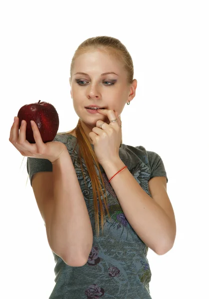 The blonde with an apple on a white background — Stock Photo, Image