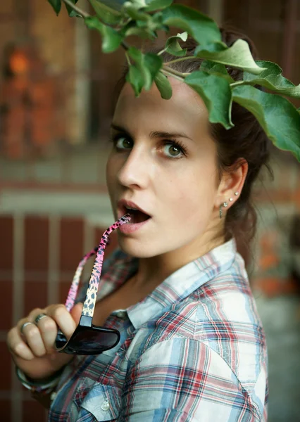 Portrait of the girl with a tree branch — Stock Photo, Image