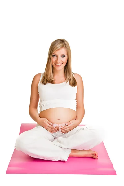 Femme blonde enceinte isolée sur blanc — Photo