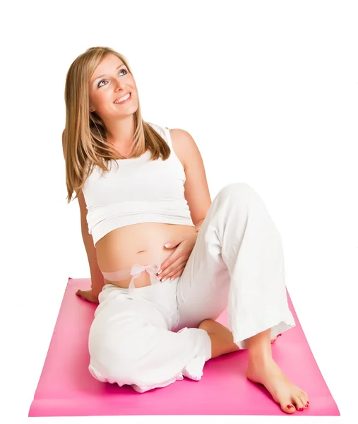 Donna bionda incinta isolata su bianco — Foto Stock