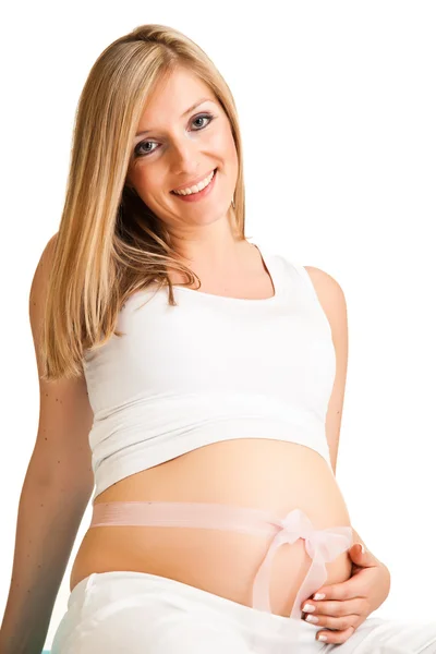 Hamile sarışın bir kadın üzerinde beyaz izole — Stok fotoğraf