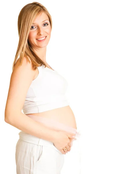 Zwangere blonde vrouw geïsoleerd op wit — Stockfoto