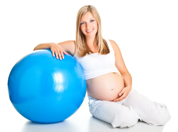 Pregnant woman excercises with gymnastic ball — Stock Photo, Image