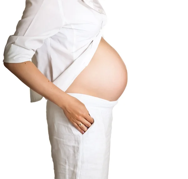 Zwangere vrouw geïsoleerd op wit — Stockfoto