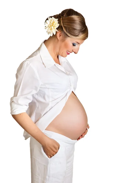 Mujer embarazada aislada en blanco Imagen de archivo