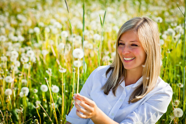 Caucasian woman in spring field