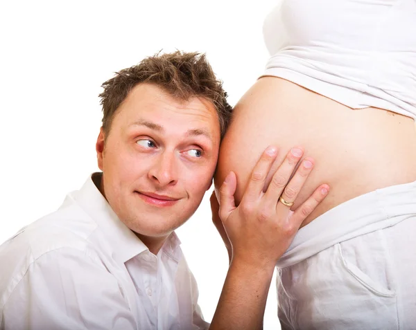 Mujer embarazada con hombre aislado en blanco —  Fotos de Stock