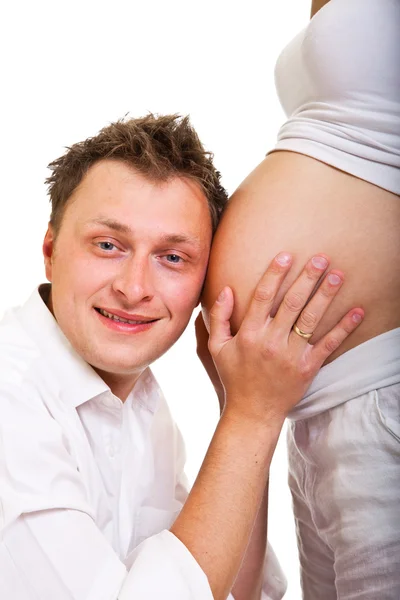 Terhes nő elszigetelt fehér emberrel — Stock Fotó