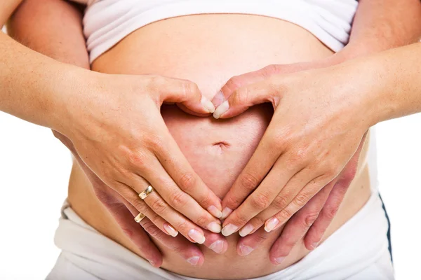 Hombre y mujer embarazada vientre aislado en blanco — Foto de Stock