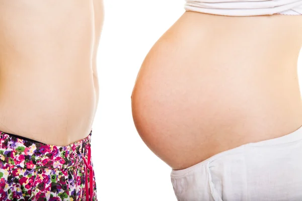 Srovnání břicha těhotných a normální — Stock fotografie