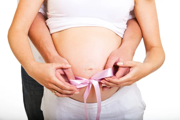 Muž a břicho těhotná žena izolované na bílém — Stock fotografie