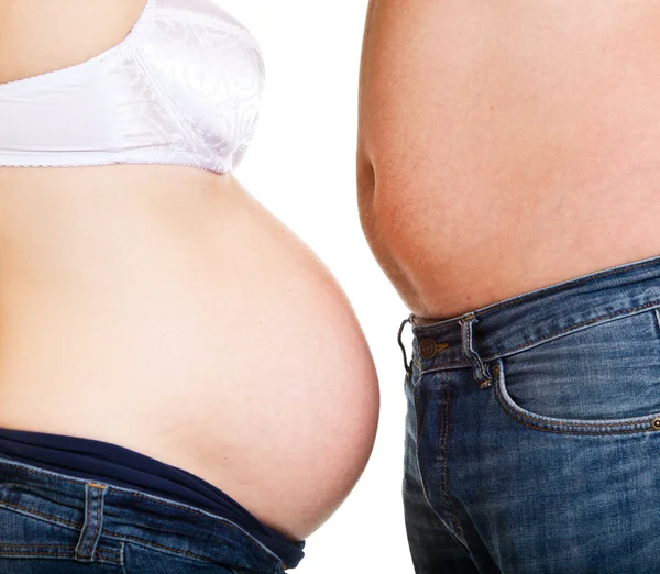 Man and pregnant woman bellies — Stock Photo, Image