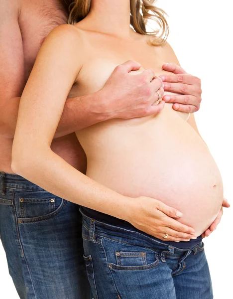 男子和孕妇肚皮上白色隔离 — 图库照片