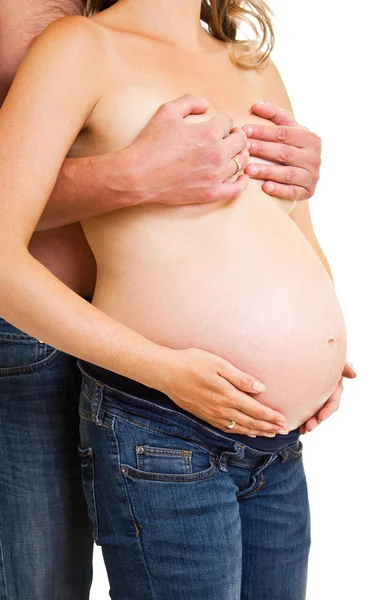 Man och kvinna som gravid mage isolerade på vit — Stockfoto