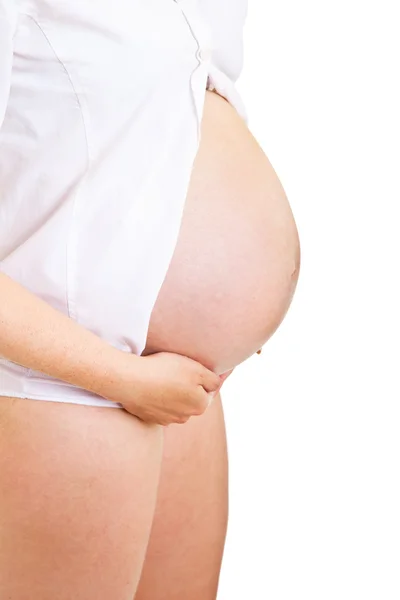 Femme enceinte isolée sur blanc — Photo