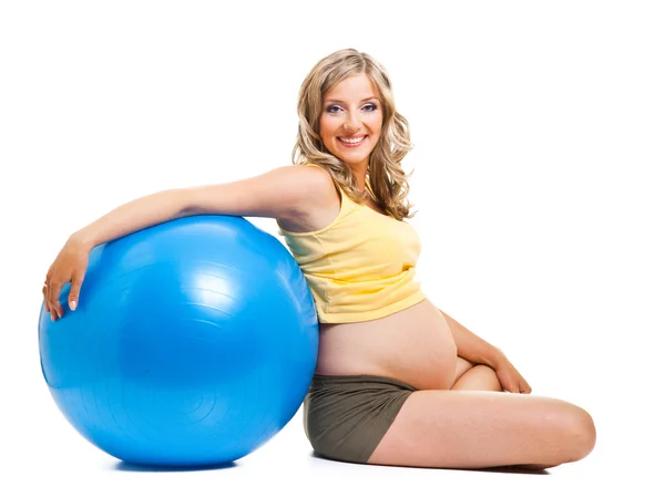 Pregnant woman with gymnastic ball isolated on white — Stock Photo, Image