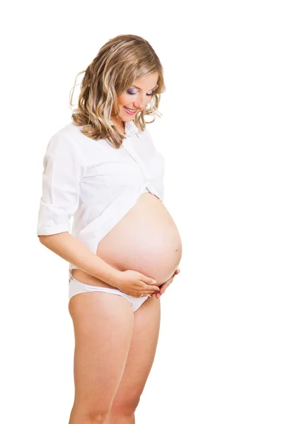Hamile kadın beyazda izole edilmiş Stok Fotoğraf