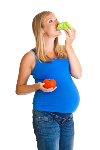 Mujer embarazada con verduras, aislada en blanco — Foto de Stock