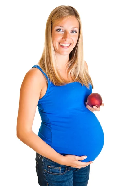 Kobieta w ciąży z brzoskwini na białym tle — Zdjęcie stockowe