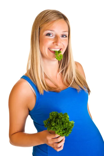 Pregnant woman with parsley isolated on white — Stock Photo, Image