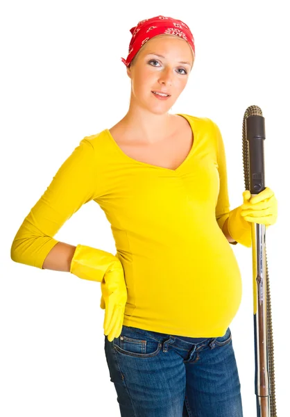 Έγκυος γυναίκα καθαρός με ηλεκτρική σκούπα που απομονώνονται σε λευκό — Φωτογραφία Αρχείου