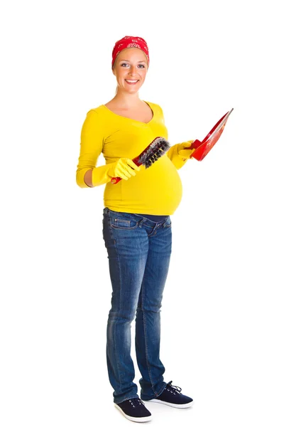 妊娠中の女性に分離された白のクリーニング — ストック写真