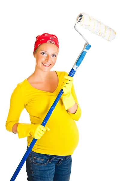 Kobieta w ciąży remont pokoju na białym tle — Zdjęcie stockowe