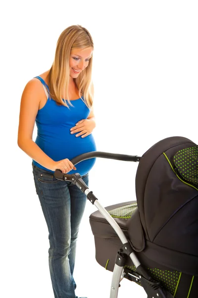 Pregnant woman with baby carriage isolated on white — Stock Photo, Image